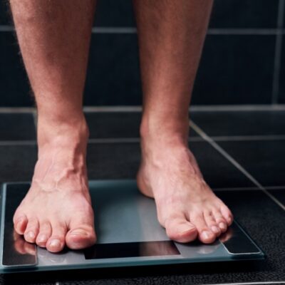 Man's feet on digital scale